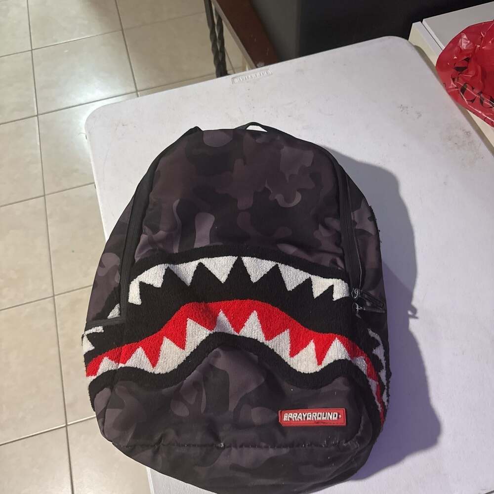 Sprayground Black Camo Shark Mouth Backpack - Picture 1 of 13